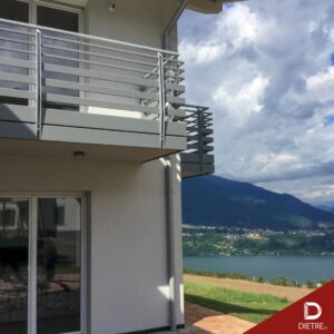 casa sul lago parapetti in alluminio dietre srl